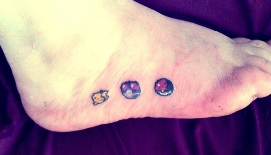8 Bit Pikachu And Pokeball Tattoo On Foot