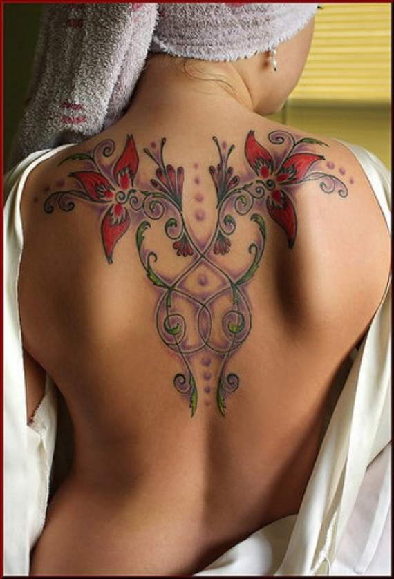 Amazing Colorful Flowers Tattoo On Girl Upper Back