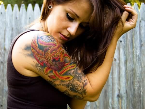 Amazing Colorful Phoenix Tattoo On Women Right Half Sleeve