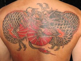 Amazing Dragon Tattoo On Man Upper Back