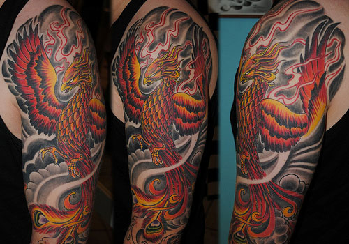 Amazing Flying Phoenix Tattoo On Left Half Sleeve