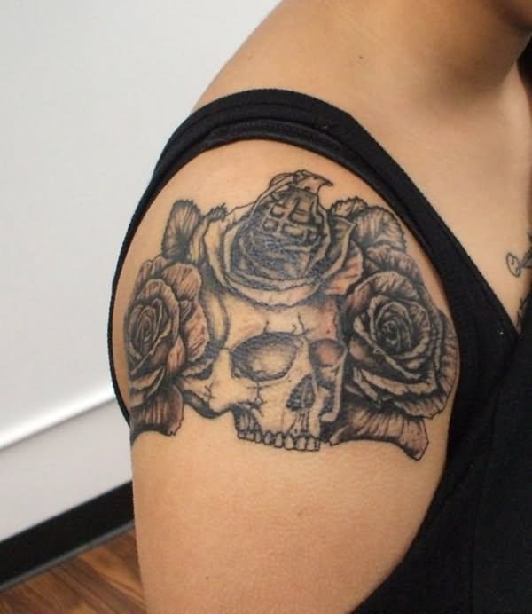 Amazing Grey Skull And Rose Flowers Tattoo On Shoulder