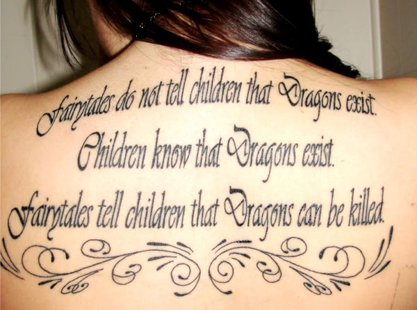 Awesome Quote Tattoo On Girl Upper Back