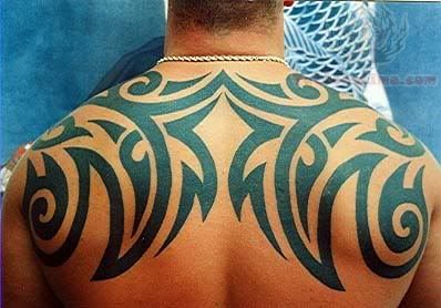 Awesome Tribal Design Tattoo On Man Upper Back