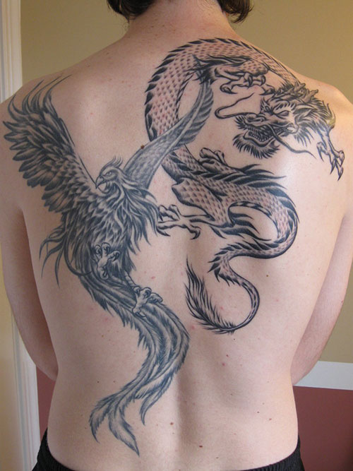 Black And Grey Girly Phoenix With Dragon Tattoo On Full Back
