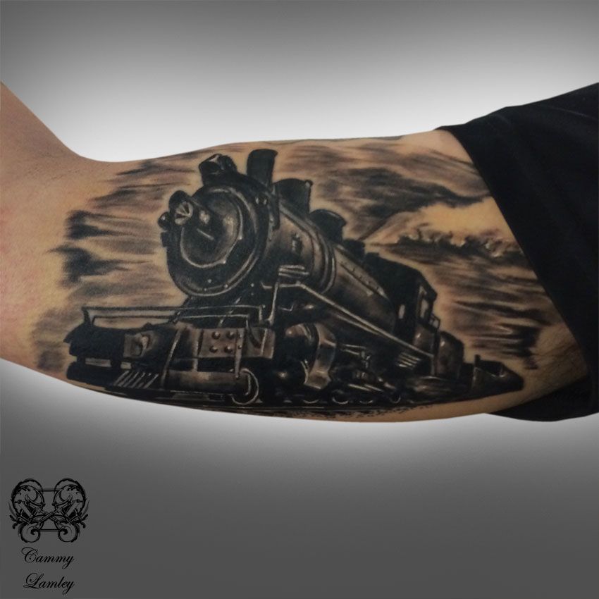 Black And Grey Old Train Engine Tattoo Design For Bicep