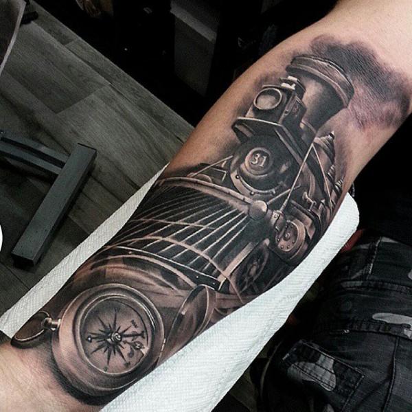 Black And Grey Old Train With Compass Tattoo On Forearm