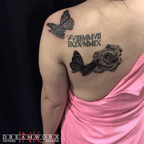 Black Butterflies And Rose Flower Tattoo On Left Back Shoulder