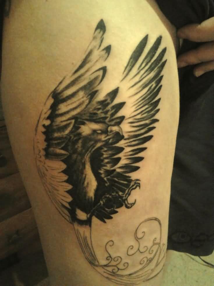 Black Ink Phoenix Tattoo On Upper Leg