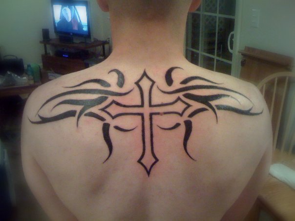 Black Outline Tribal Design Tattoo On Upper Back