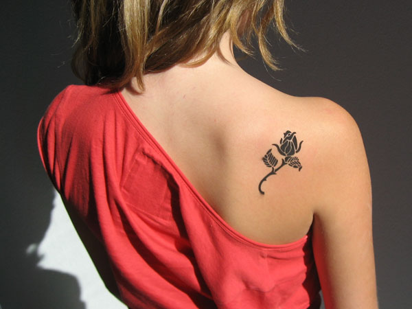 Black Rose Tattoo On Girl Upper Side Back