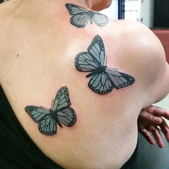 Blue Butterflies Tattoos On Right Back Shoulder