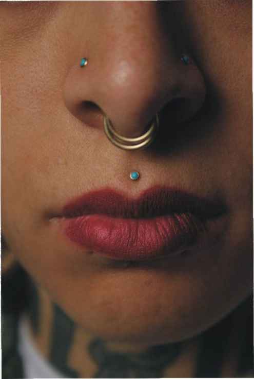 Blue Stud Medusa And Double Nose Piercing
