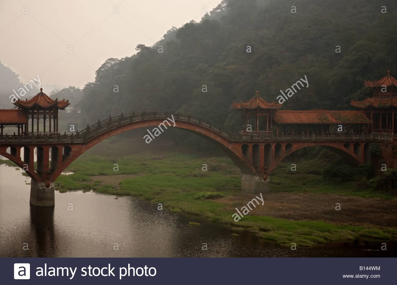 Bridge Over A River Leading  Leshan Giant Buddha