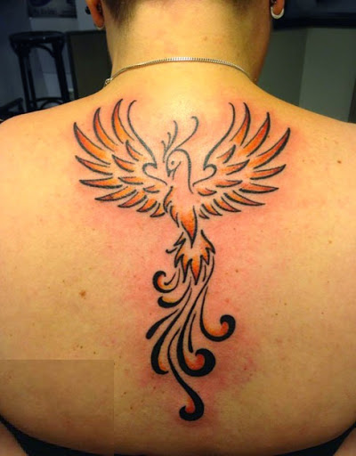 Classic Black And Orange Phoenix Tattoo On Man Upper Back