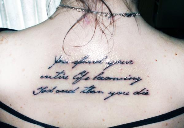 Classic Quote Tattoo On Upper Back