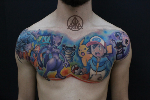 Colorful Pokemons With Ash Tattoo On Man Chest