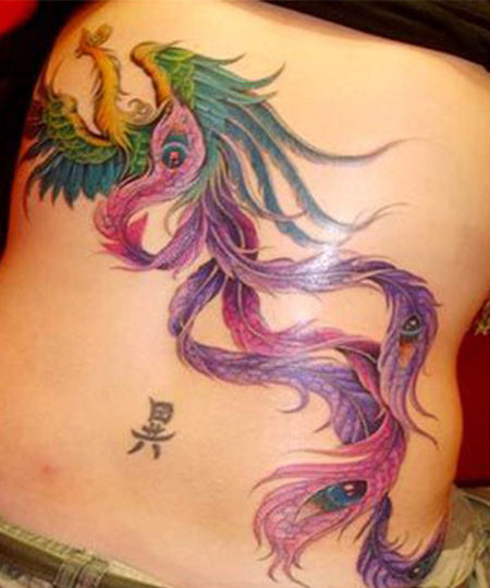 Colorful Rising Phoenix From The Ashes Tattoo Design For Lower Back