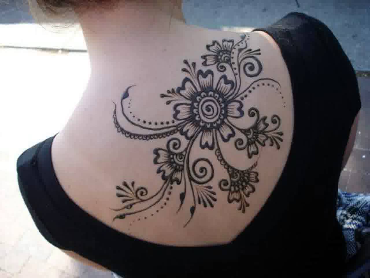 Cool Black Outline Flowers Tattoo On Upper Back By Cheers