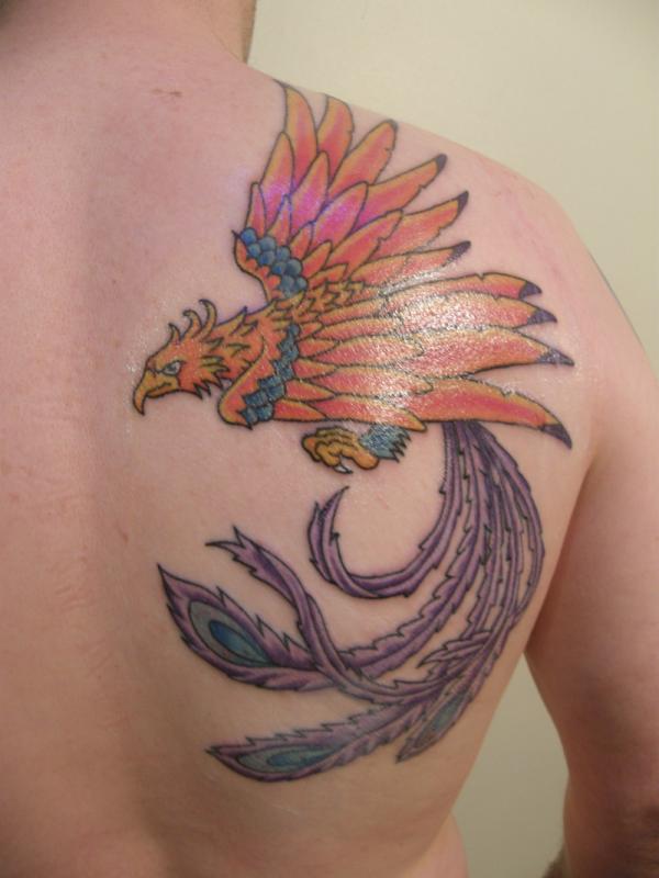 Cool Phoenix Tattoo On Upper Right Back