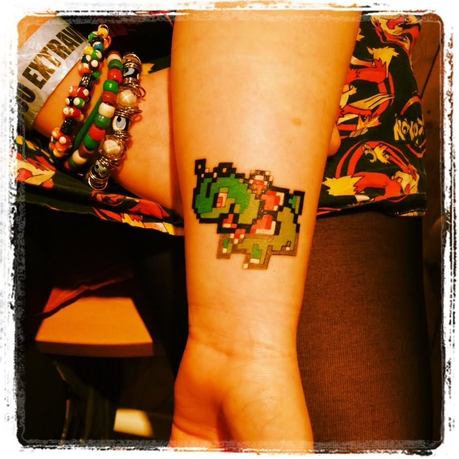 Cool Pokemon Tattoo On Wrist By Emily