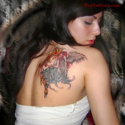 Cute Angel Tattoo On Girl Upper Right Back