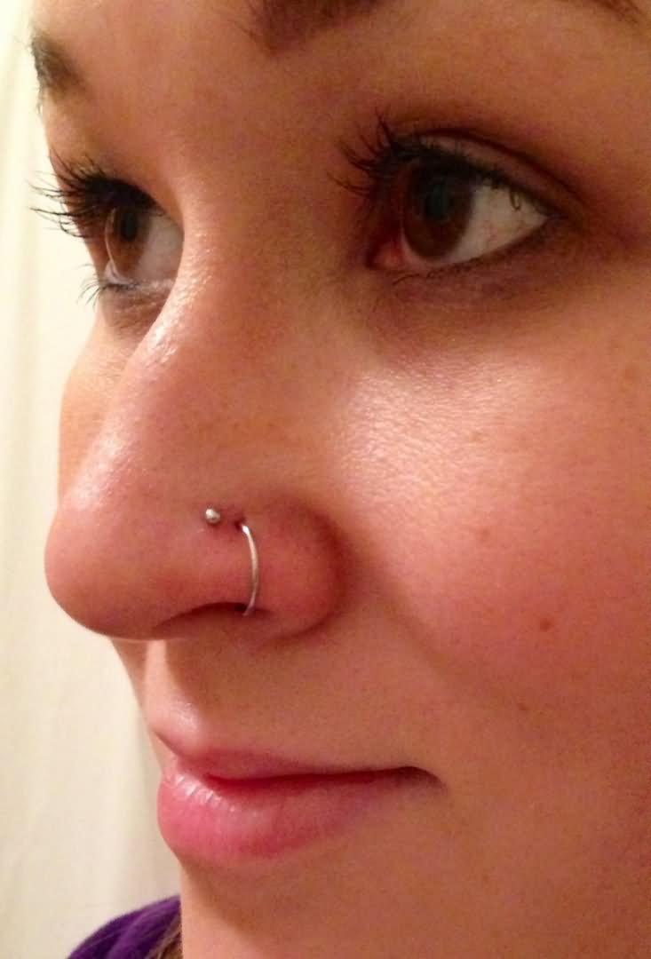 Double Nose Piercing With Stud And Ring
