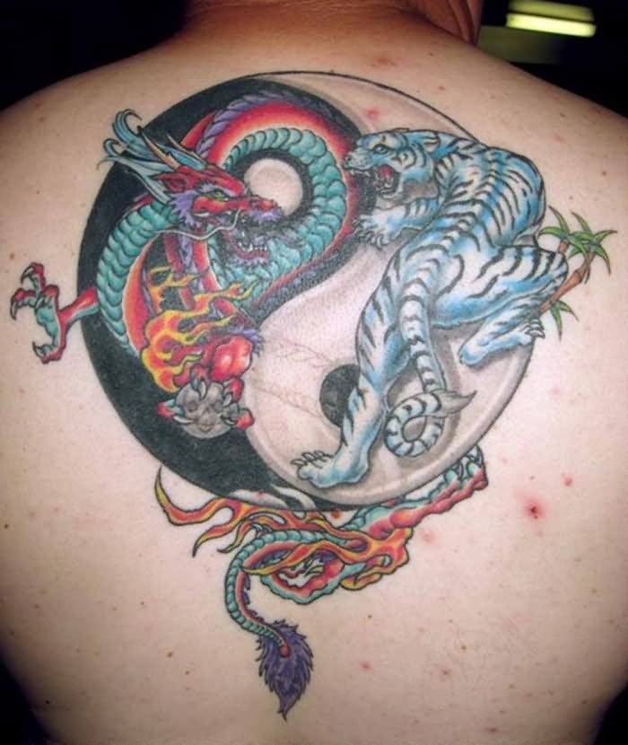 Dragon And Tiger In Yin Yang Tattoo On Man Upper Back