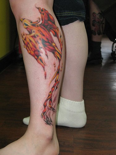Flaming Phoenix Tattoo On Left Leg Calf