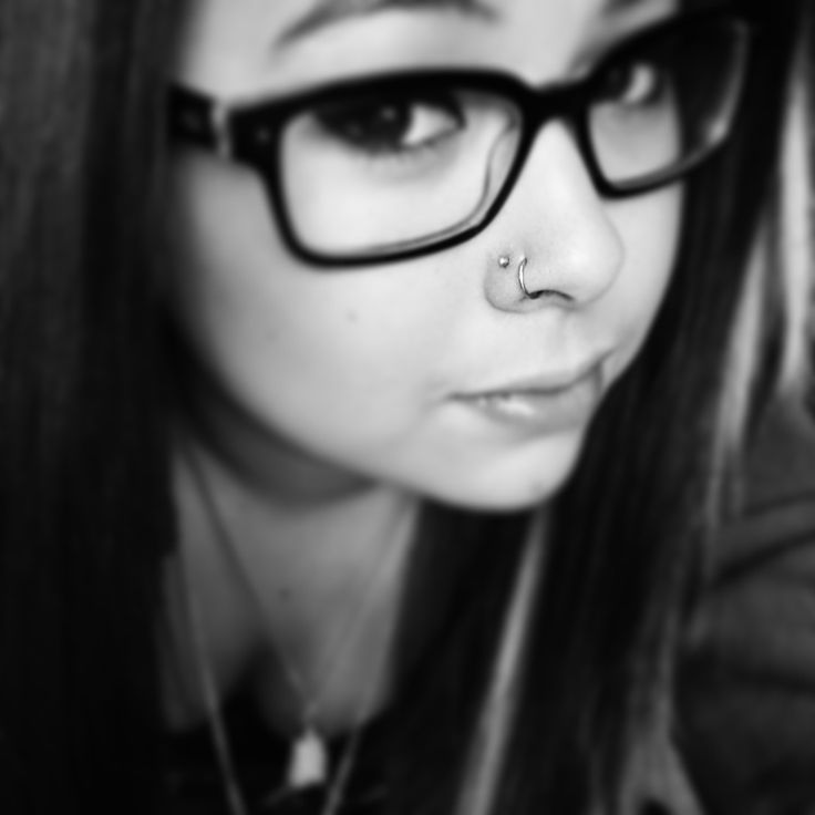 Girl Showing Her Double Nose Piercing