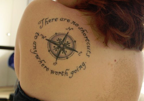 Grey Ink Compass Tattoo On Girl Upper Side Back