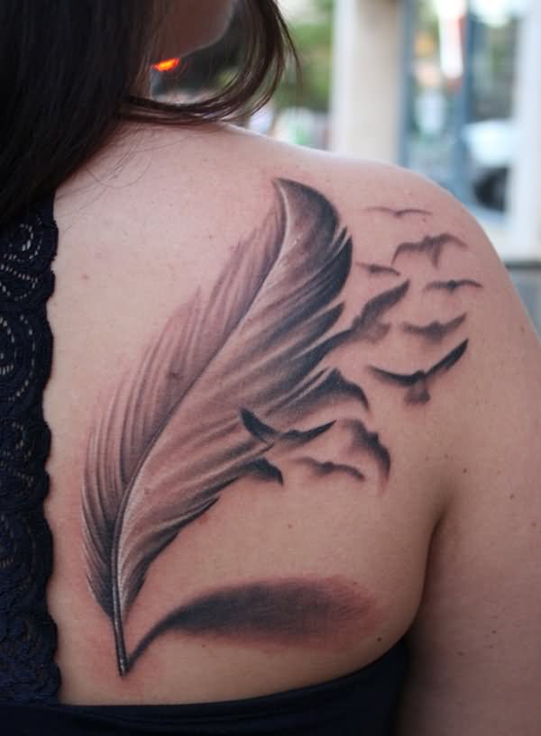Grey Ink Feather With Flying Birds Tattoo On Girl Upper Right Back