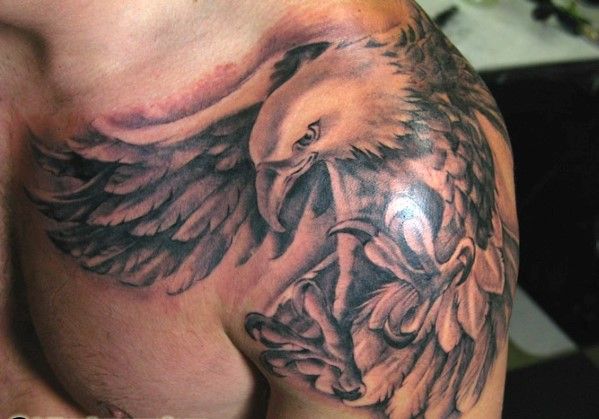 Grey Ink Flying Eagle Shoulder Tattoo
