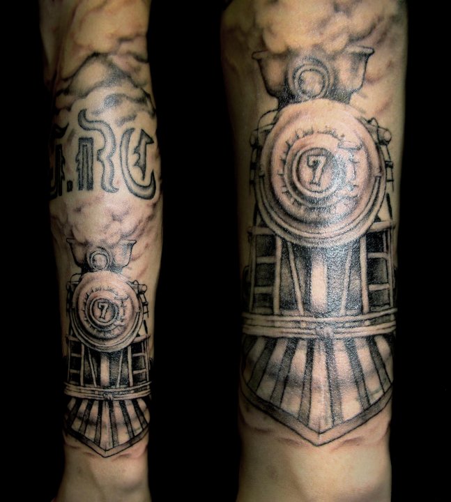 Grey Ink Old Train Engine Tattoo Design For Arm