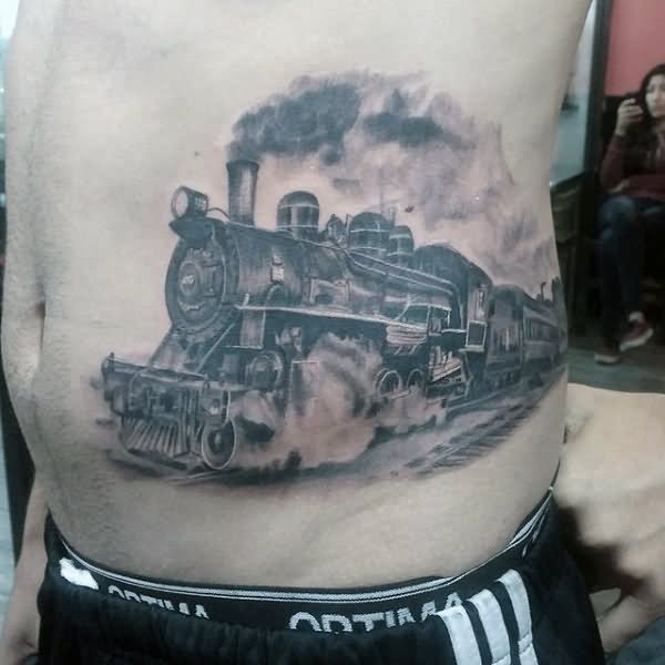 Grey Ink Steam Train Engine Tattoo On Man Side Rib