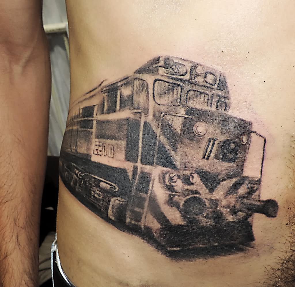Grey Ink Train Tattoo On Man Side Rib By Facundo Pereyra