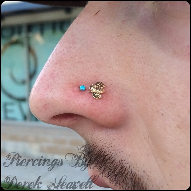 Nose ring Double Nose Piercings With Gold Rings new england jewelry designs...