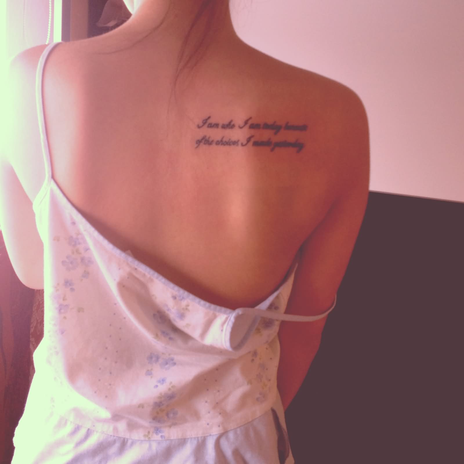 I Am Who I Am Today Because Of The Choices I Made Yesterday Quote Tattoo On Upper Right Back