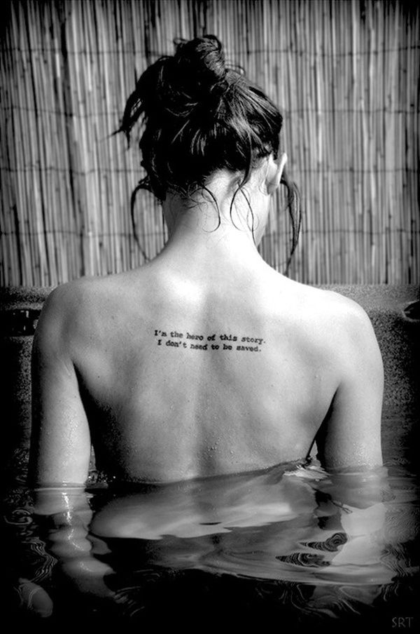 I'm The Hero Of This Story I Don't Need To Be Saved Quote Tattoo On Girl Upper Back