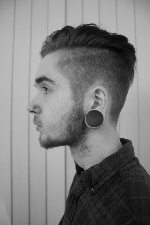 Left Ear Lobe And Double Nose Piercing Picture
