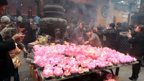 Lighting Candles At The Jade Buddha Temple