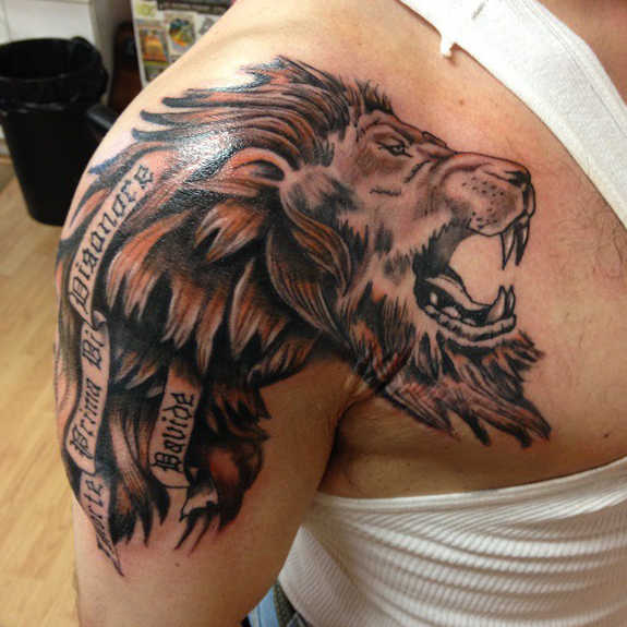 Lion Head Tattoo On Front Shoulder