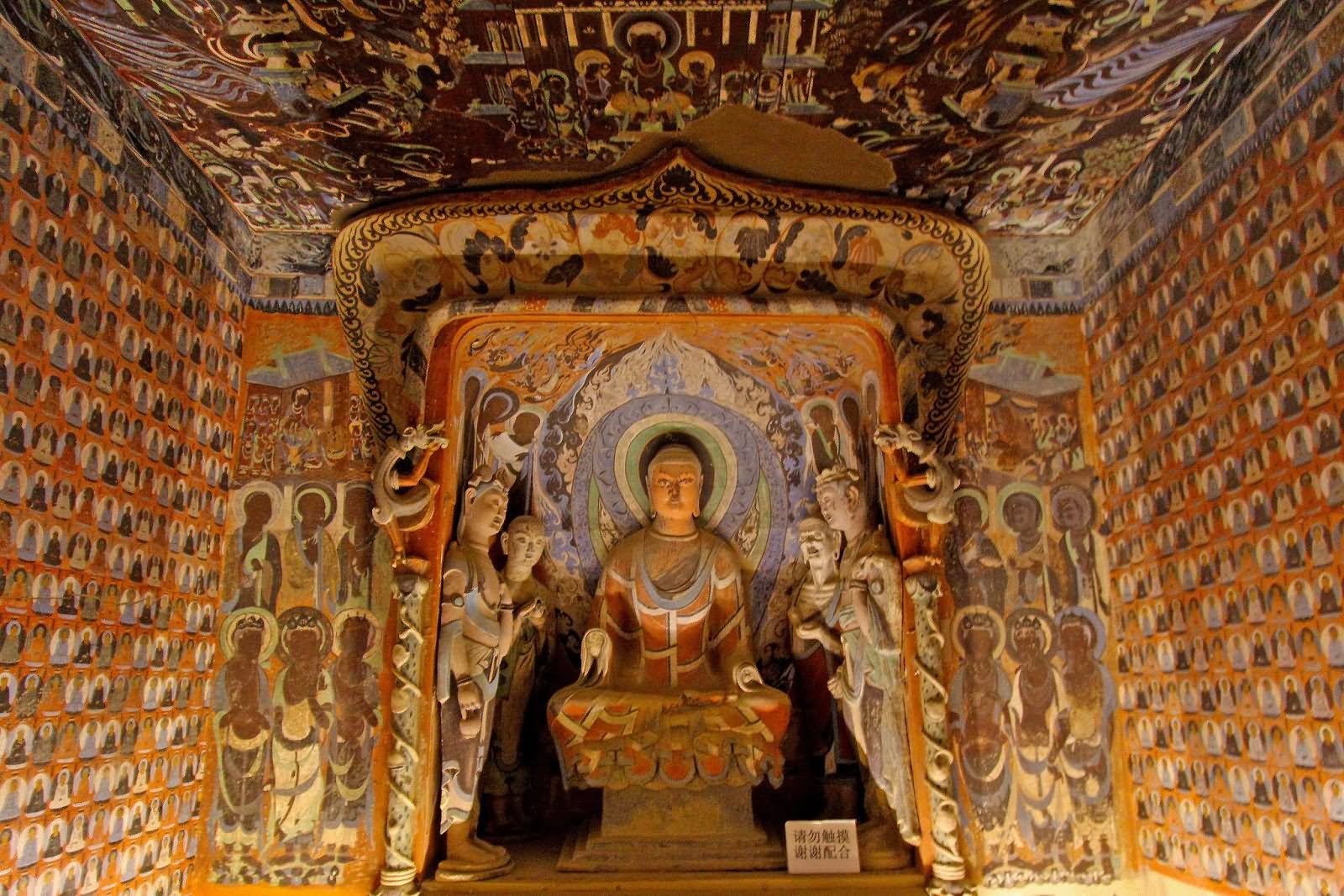 Lord Buddha Statue Inside The Mogao Caves At Dunhuang