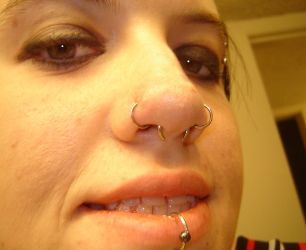 Lower Lip And Double Nose Piercing Picture For Girls