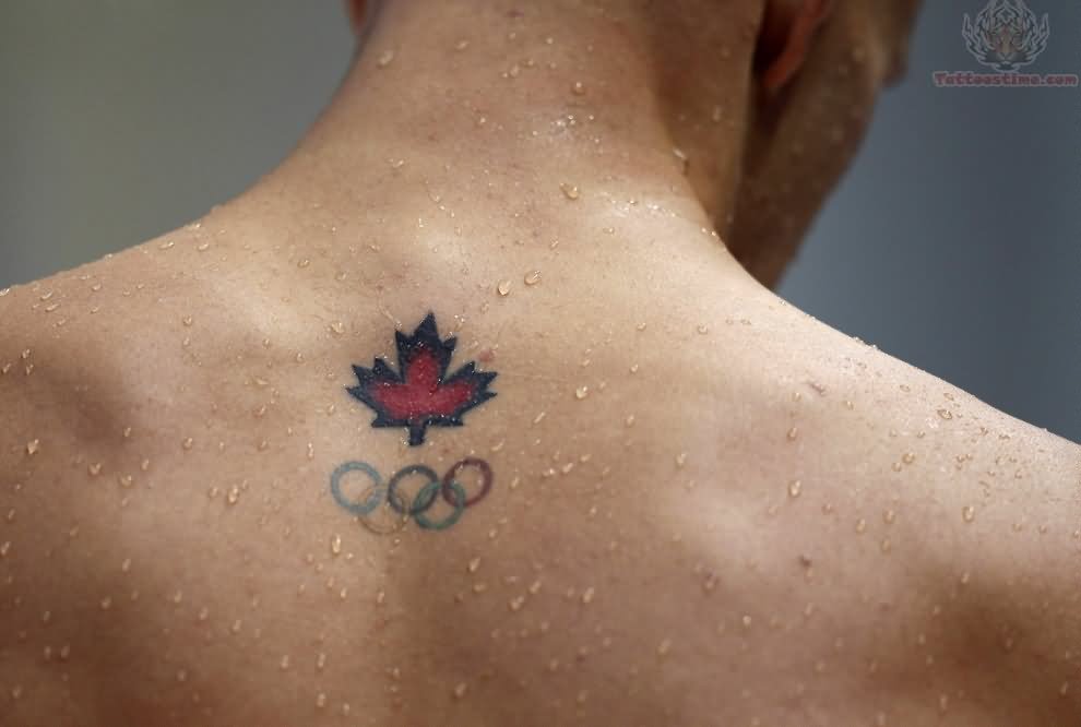 Maple Leaf With Olympic Symbol Tattoo On Upper Back
