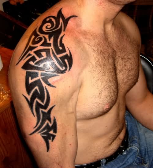 Nice Black Tribal Tattoo On Shoulder