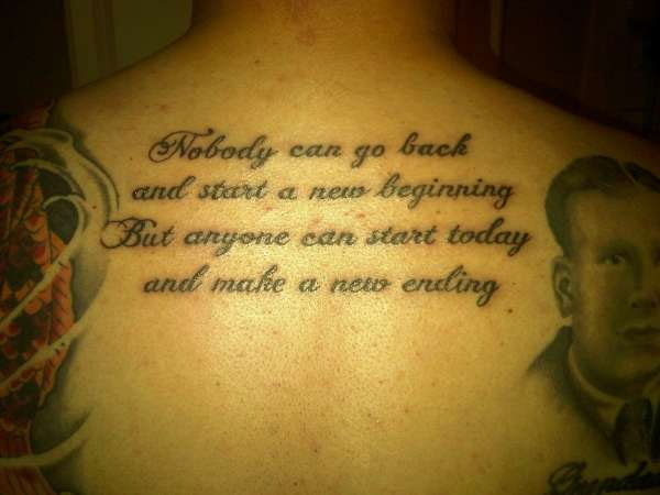 Nobody Can Go Back And Start A New Beginning But Anyone Can Start Today And Make A New Ending Quote Tattoo On Upper Back