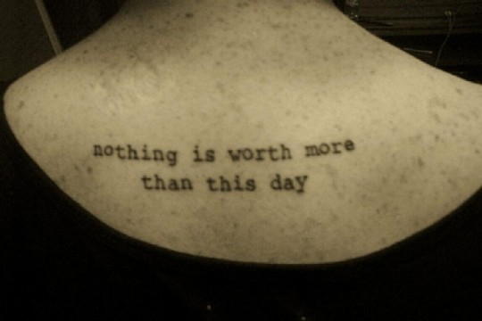 Nothing Is Worth More Than This Day Quote Tattoo Design For Upper Back