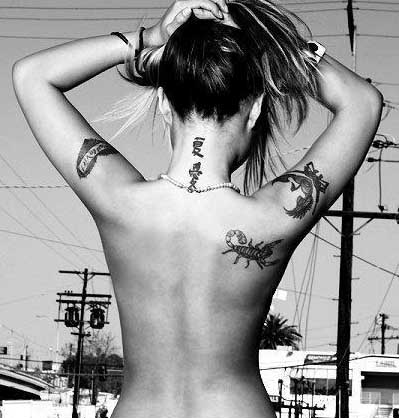 Scorpion Tattoo On Girl Upper Side Back