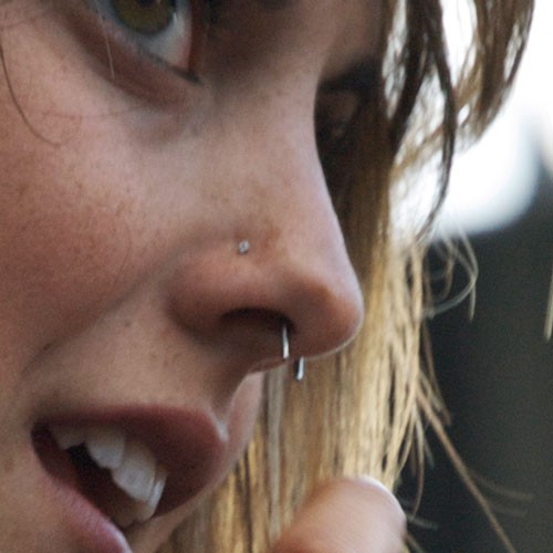 Septum And Nostril Double Nose Piercing